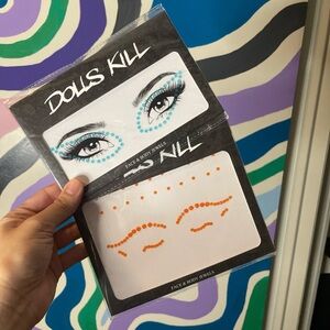 Two Packs Of Face Gems